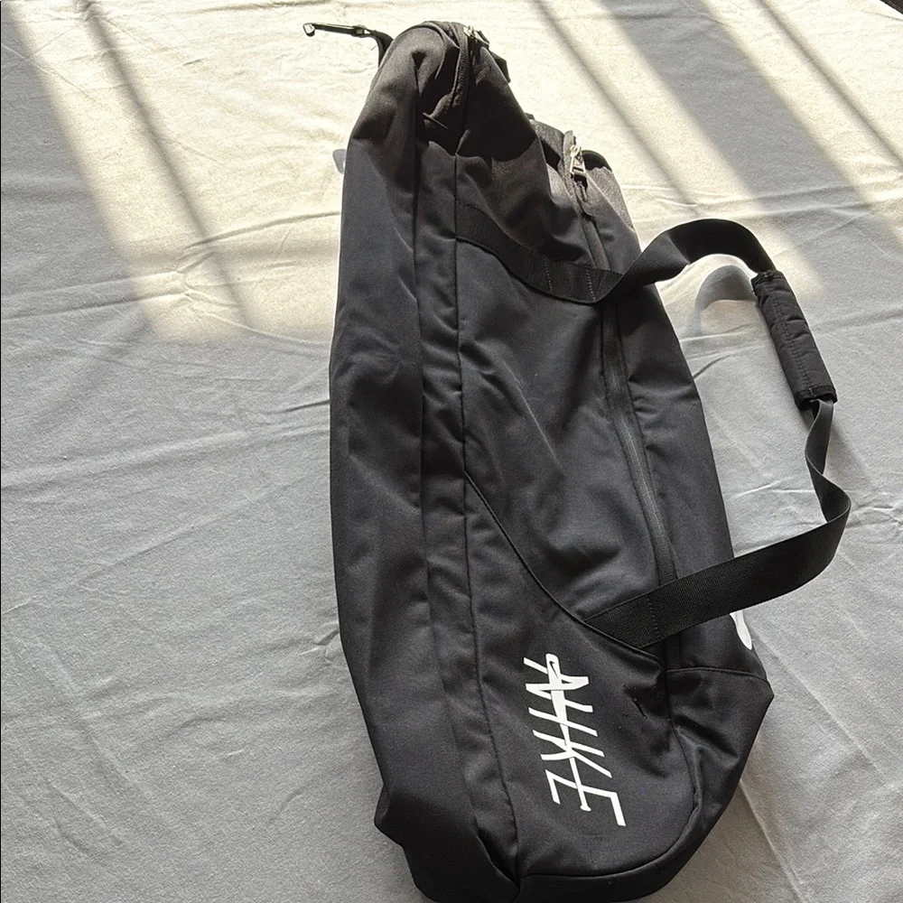 Nike Black Baseball Duffel Bag with Durable Fabric and Shoulder Strap